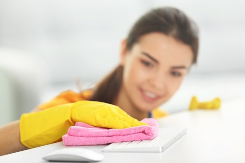 Detailed kitchen cleaning during a Holland Park move in service